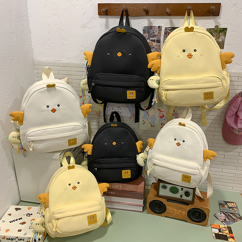 2025 nueva mochila escolar mochila ligera mochila niña lindo jardín de infantes mochila pequeña bolsa de dibujos animados casuales