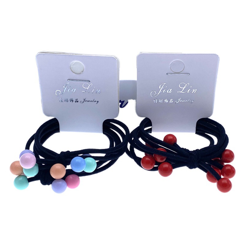 Tres en uno de color caramelo cuentas de color lazo banda de pelo banda de goma cuerda de pelo entidad dos yuanes tienda accesorios para el cabello accesorios para la cabeza