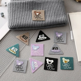 布贴;洗唛、商标;服装饰品