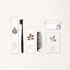 Japanese-style design hotel guesthouse one-time use bathroom supplies set including toothbrush, toothpaste, oral care accessories, comb, and shower kit