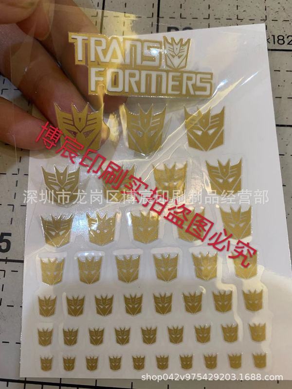 カスタマイズされた既製トランスフォーマーおもちゃロゴステッカーディンセプターキンティアンジュ転写ステッカー UV ティアオフフィルムラベル|undefined