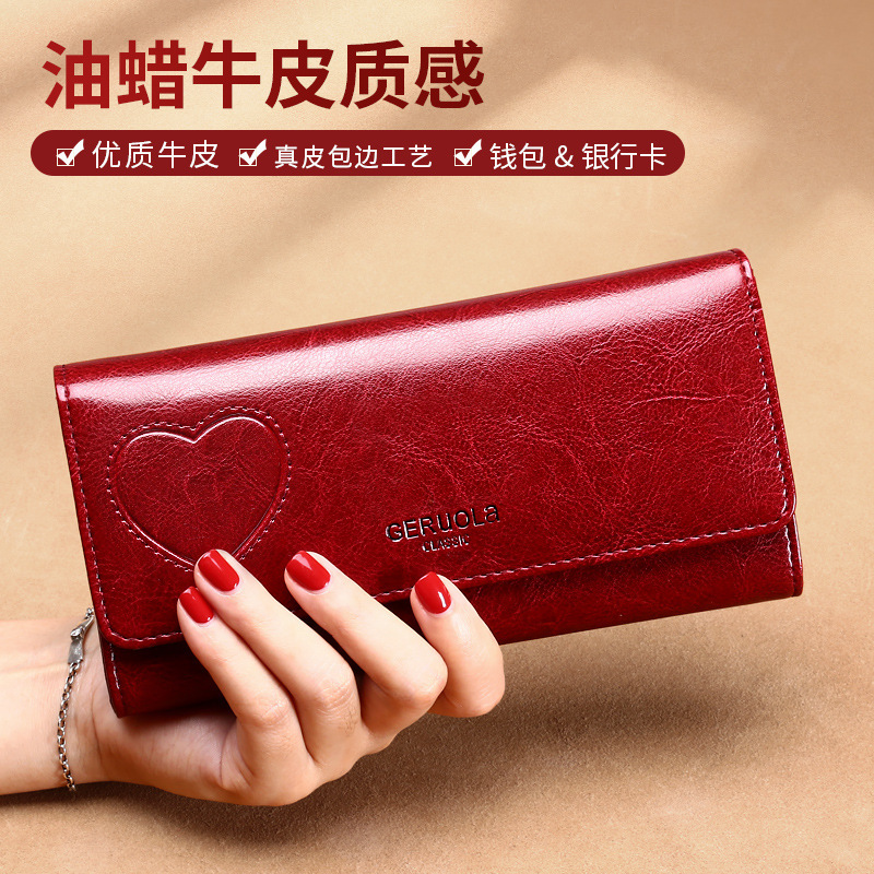 Cartera de suministro directo de fábrica para mujer, tarjetero de cuero de gran capacidad de mano larga, cartera multifuncional integrada, nuevo estilo 2025