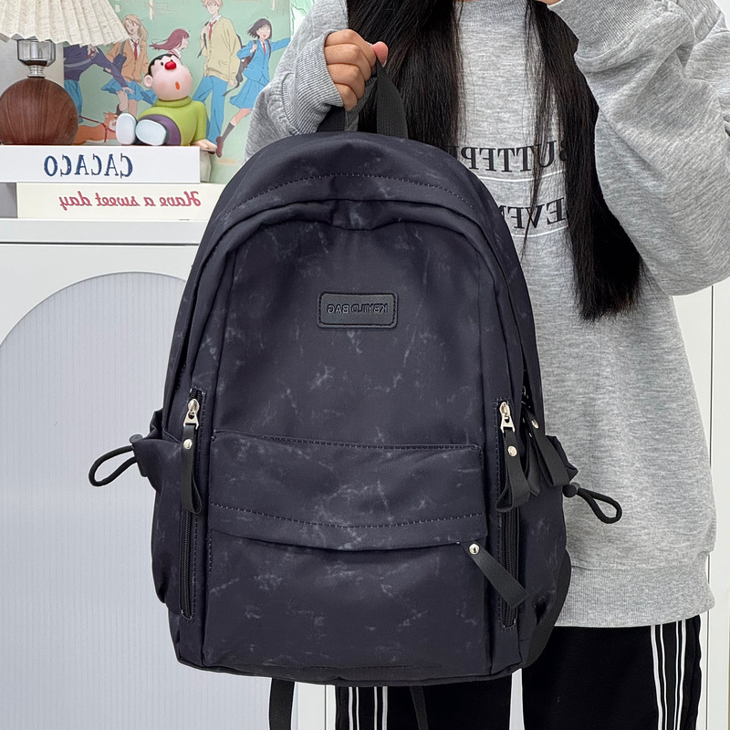 新款初高中学生书包潮酷大容量休闲背包简约时尚个性情侣双肩包