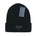 Triangular black knitted hat