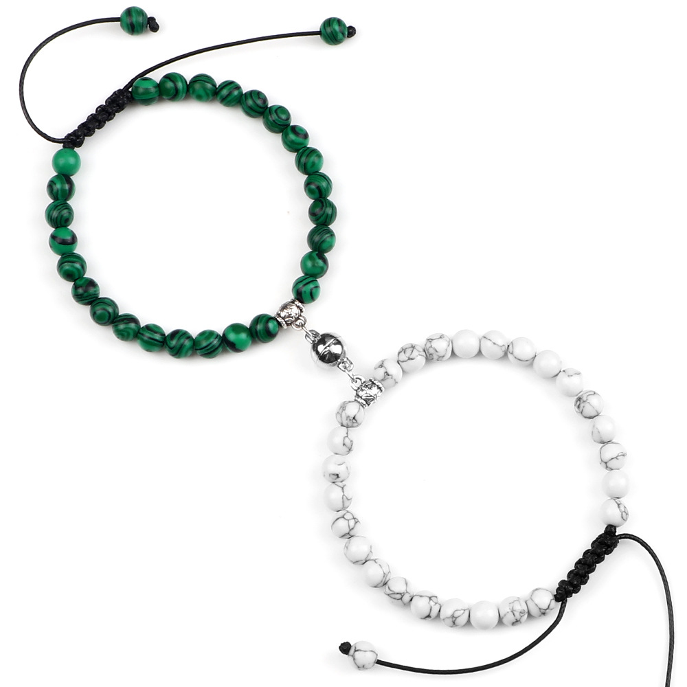 Paararmbänder ein Paar Freundinnen Perlen Nische geflochtenes Design Handseil runde Magnetschnalle Saugnapf Anhänger Armband Spot_voghion.com