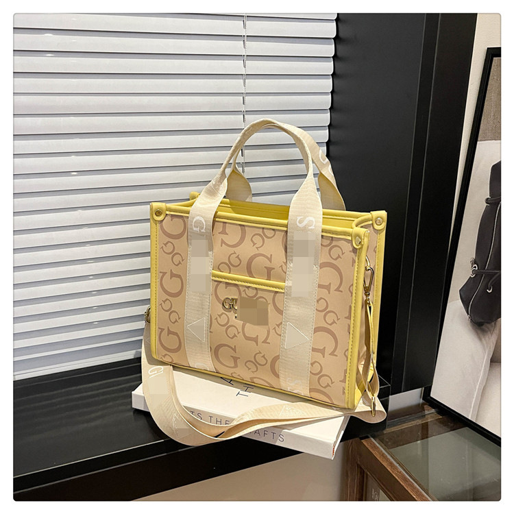 Bolso bandolera con letras de comercio exterior transfronterizo para mujer 2025 nueva tendencia de moda bolso de mensajero portátil impreso