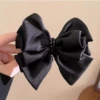 Black dice, crab pin