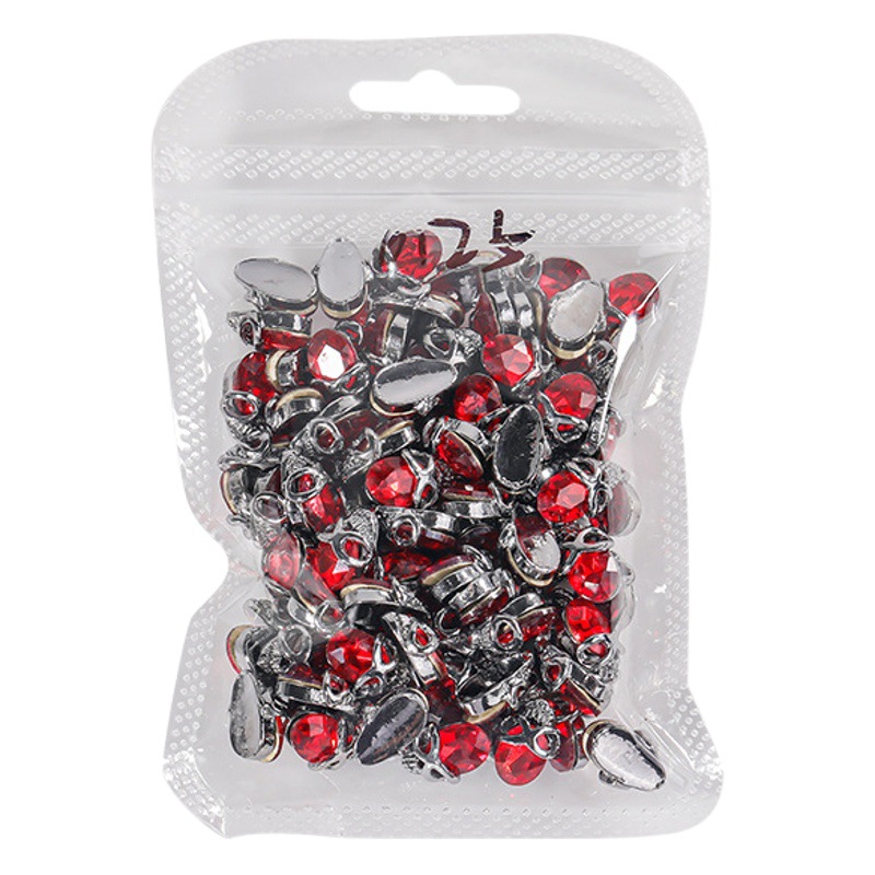 Accesorios de uñas de celebridades en línea estilo oscuro de ganchillo araña cráneo Cruz accesorios de diamantes de uñas calientes de Halloween al por mayor