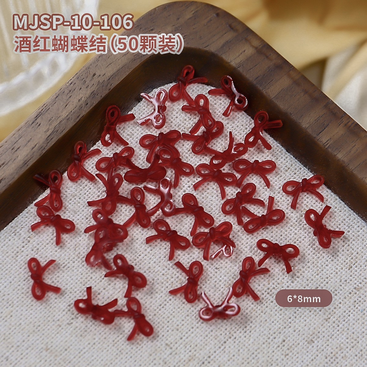 Explosiones de vino rojo flotante arco joyas de manicura línea simple arco uñas decoración pequeña al por mayor