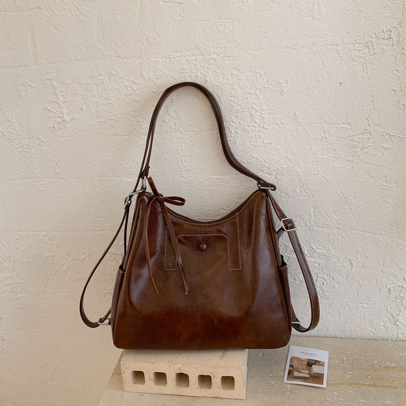 Bolsas transfronterizas de gran capacidad para mujeres 2026 retro nicho mochila de hombro de viaje ocio mochila tote