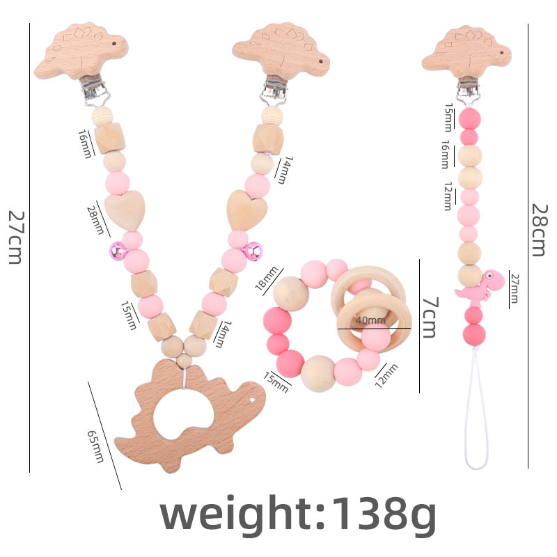 Suministros para bebés pulsera de silicona molar de juguete para niños Cadena de cochecito de dinosaurio de tres piezas creativa pequeña campana colgante