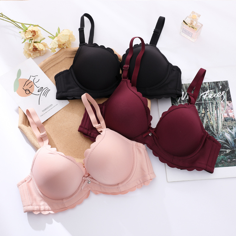 Fábrica de sujetadores de Shantou en stock brillante sin marcas de grosor pequeño sujetador de ropa interior para mujeres ajustable soporte superior para evitar caída