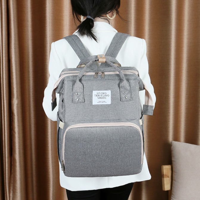 Bolso de mamá de cama plegable portátil nuevo estilo bolsa de leche portátil de gran capacidad para madres y bebés bolsa de cama de mamá multiusos