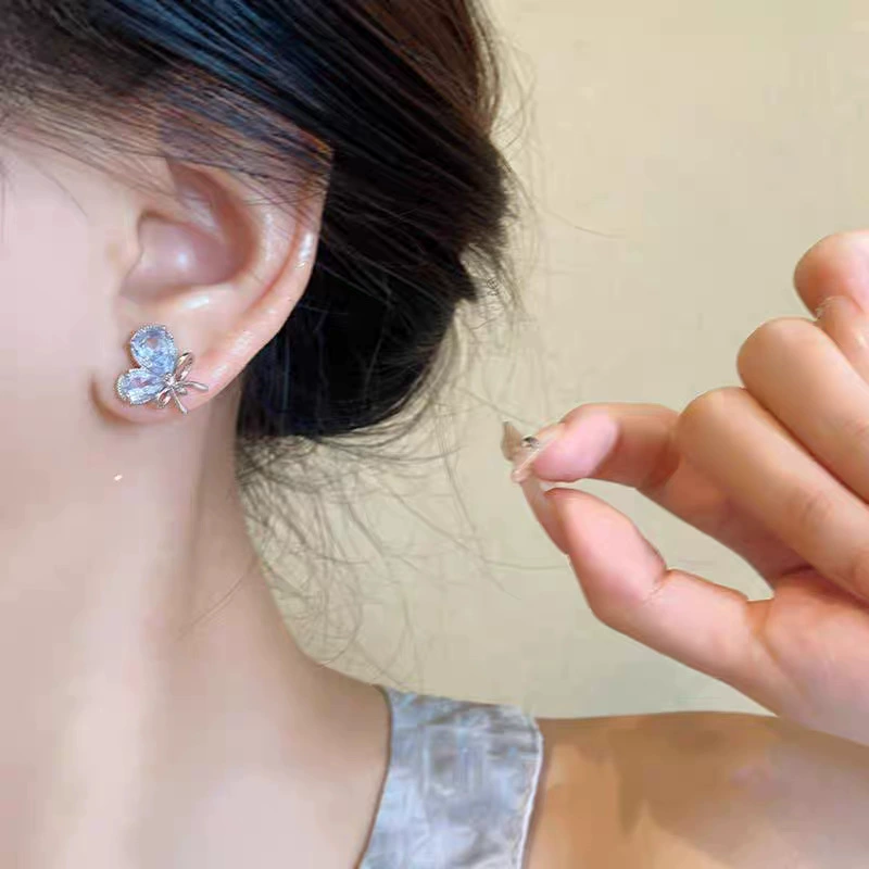 Универсальные небольшие голубые серьги с бантиком и zircone, стиль светлый люкс, стиль высокого качества