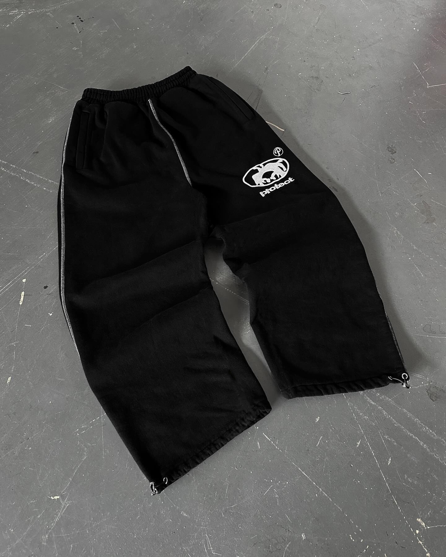 Transfronterizos pantalones deportivos de otoño y invierno bordados letras calles pantalones de marca de moda casual pantalones recto comercio exterior