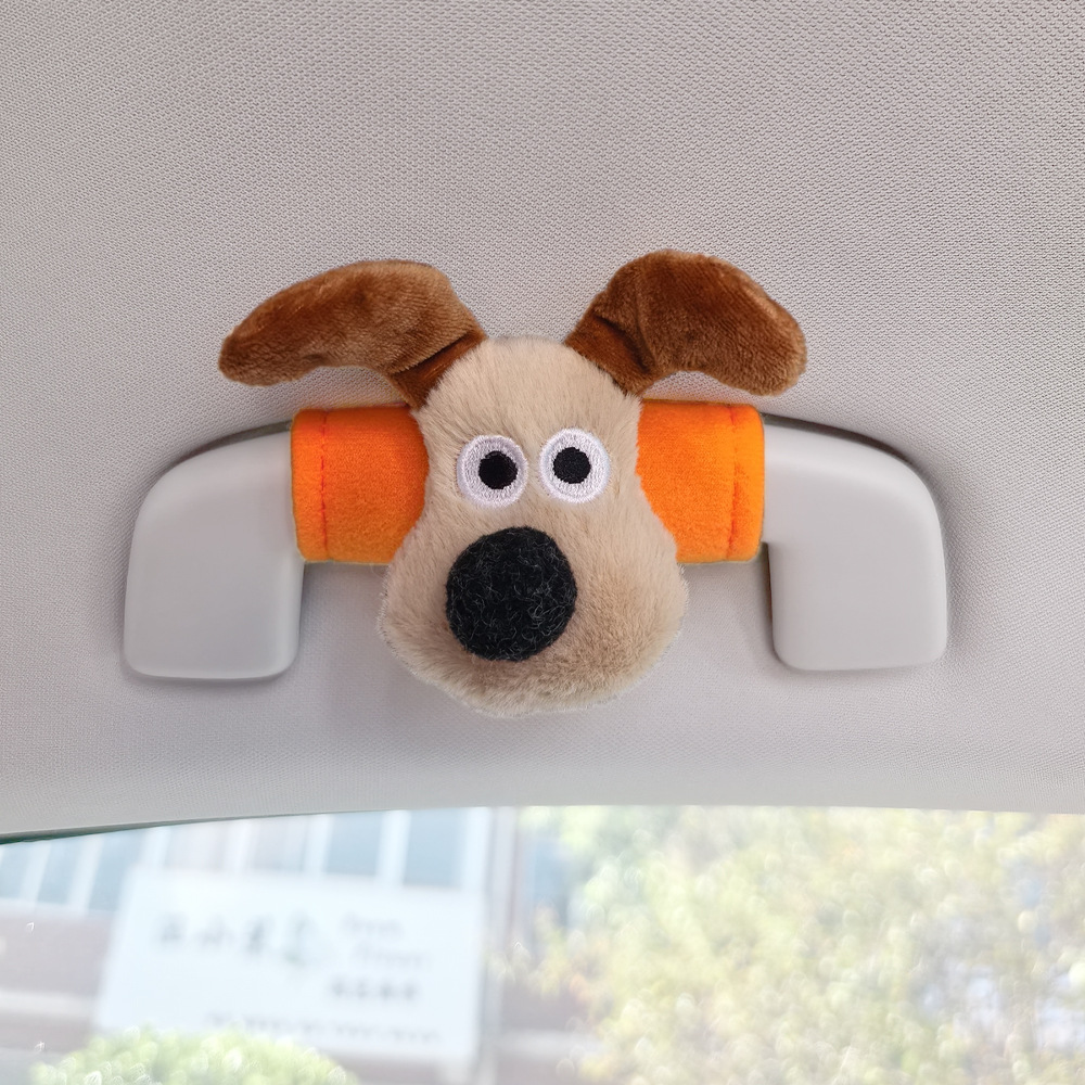Perro de peluche maneja de automóvil maneja de automóvil masculino y femenino maneja de puerta interior cubierta guante de techo