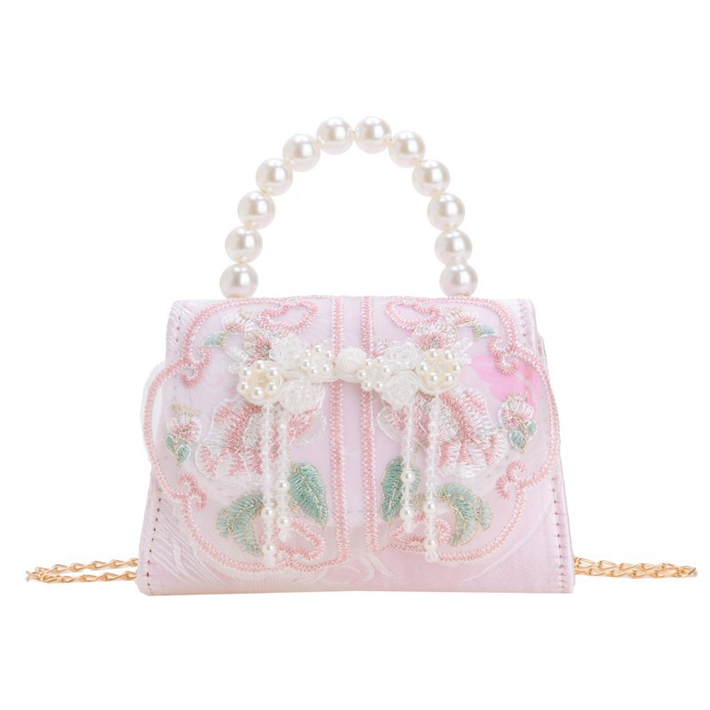 Mochila de moda para niñas, bolso de perla de arco dulce, bolso de mano de 2025 nuevo bolso de cadena para niños