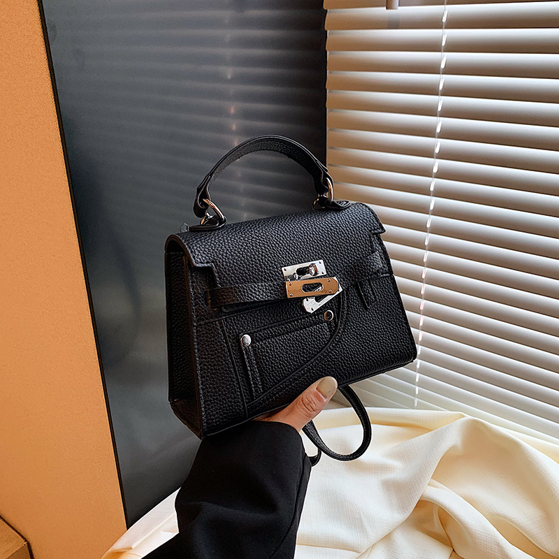 Nicho de diseño Kelley bolso 2024 otoño nuevo bolso de mano lichi mochila texturas extranjeras mochila para mujeres