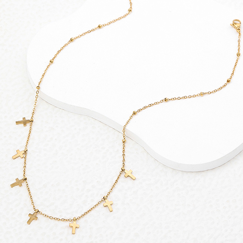 Accessoires de coupe de bijoux exquis en acier inoxydable de style coréen, croix de fleur en forme de 8, collier en acier titane doré pour_voghion.com