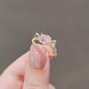 Japanese cute adjustable ring with bow, light luxury style, on index finger