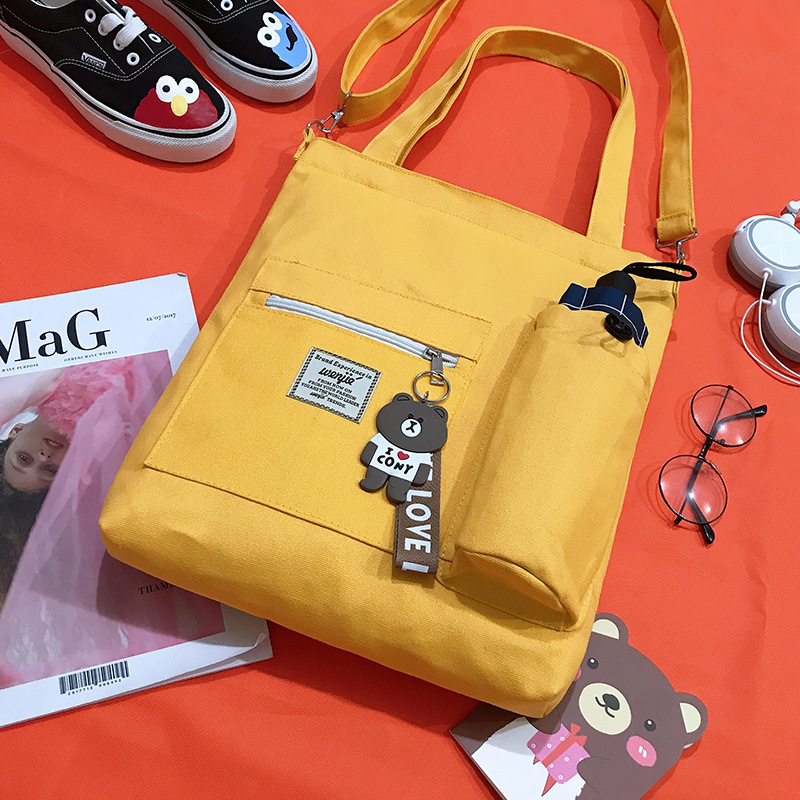Bolsa de lona de las mujeres bolsa de mensajero estudiante japonés ins estilo bolso de hombro coreano simple todo-fósforo bolso de gran capacidad