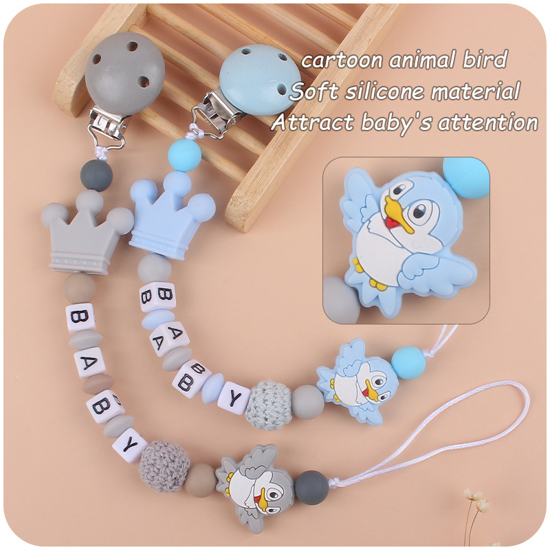 Nuevo bebé suministros de silicona chupete cadena de dibujos animados animal pájaro silicona mordedura pegamento cadena molar cadena anti-gota