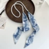 Necklace from pearl with letters