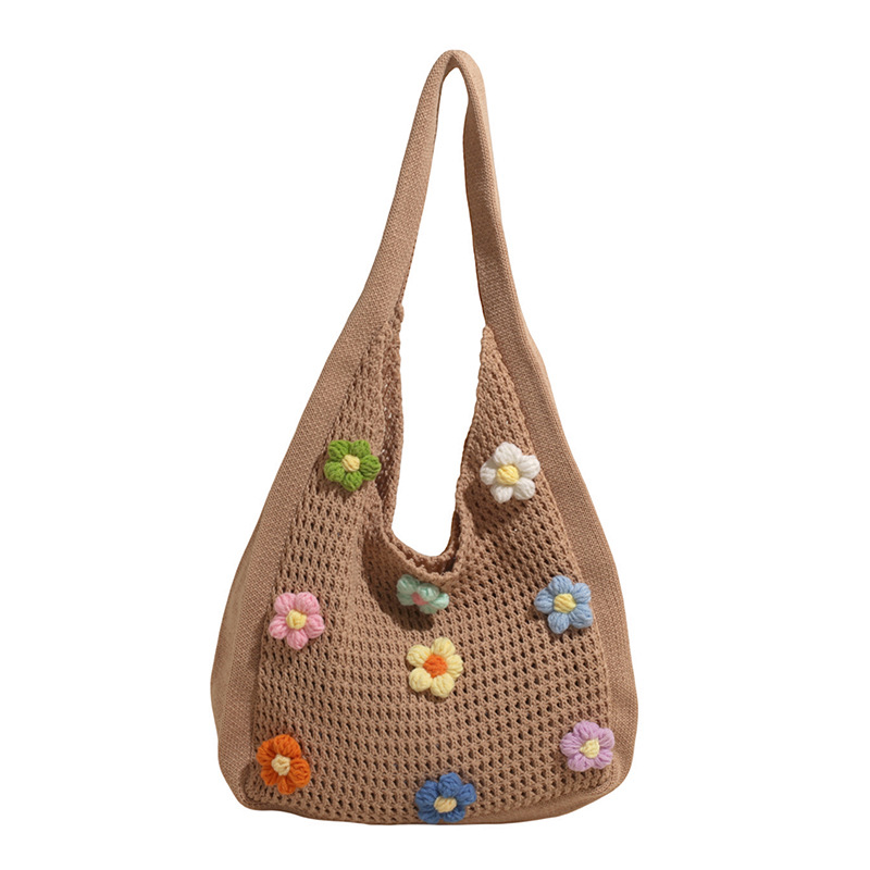 Versión coreana del bolso de nicho 2025 verano nuevo bolso femenino Xuan Yafeng flor bolso de hombro hueco de punto