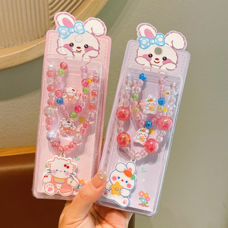 Niños exquisitos collares de dibujos animados pulseras set niñas adorables joyas de perlas princesa viento caja de regalo