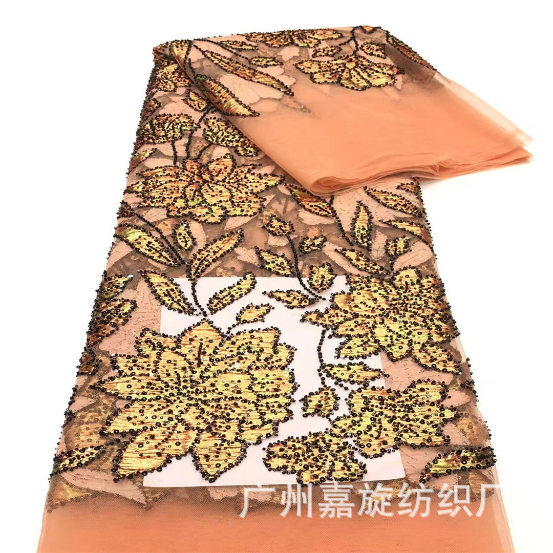 Nuevo oro estampado en relieve flor tubo de perlas sequinado bordado tela de malla vestido de moda turco tela de traje
