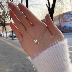 単一の真珠のジルコンのネックレスの女性の夏insの軽くて豪華な大衆の設計のジルコンのペンダントの高級な設計感の鎖