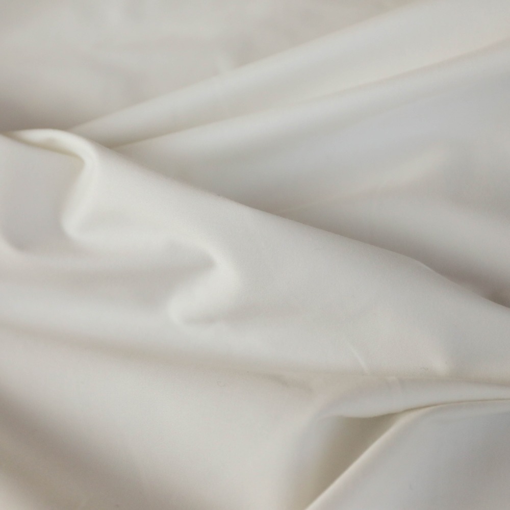 日本进口布料织锦服装白色丝光弹力锦棉面料薄款细腻设计师本斜纹