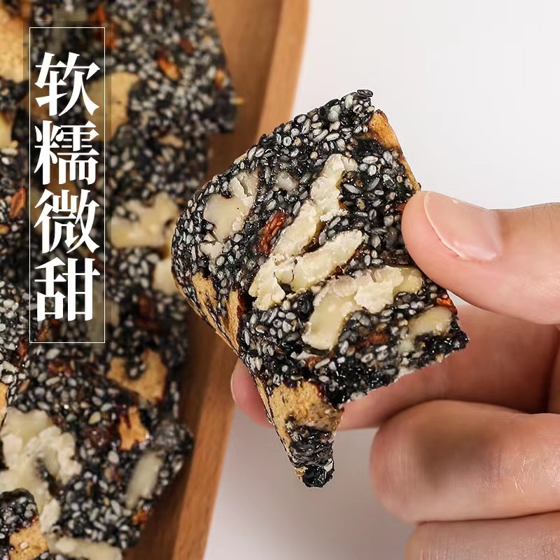 Honeycomb-shaped soft candy with black sesame, walnuts, goji berries, red dates, and nuts