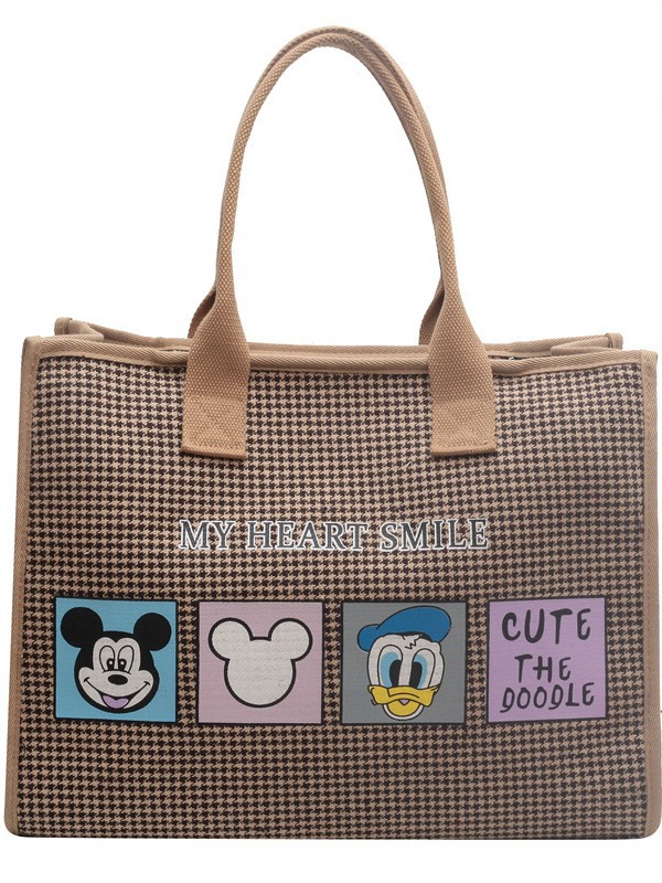 Bolso de mujer de alta sensación 2025 nuevo lienzo simple impresión de gran capacidad bolso de mano bolso de hombro de caricatura mamá