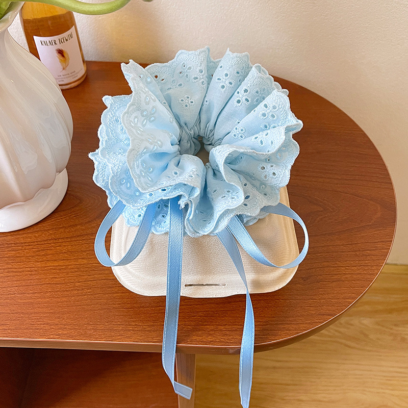 Pastoral viento intestino anillo de cabello mujer 2025 nuevo estilo de alta sensación bola de cabello cuerda de cabeza flor dulce princesa adornos de cabello cuerda