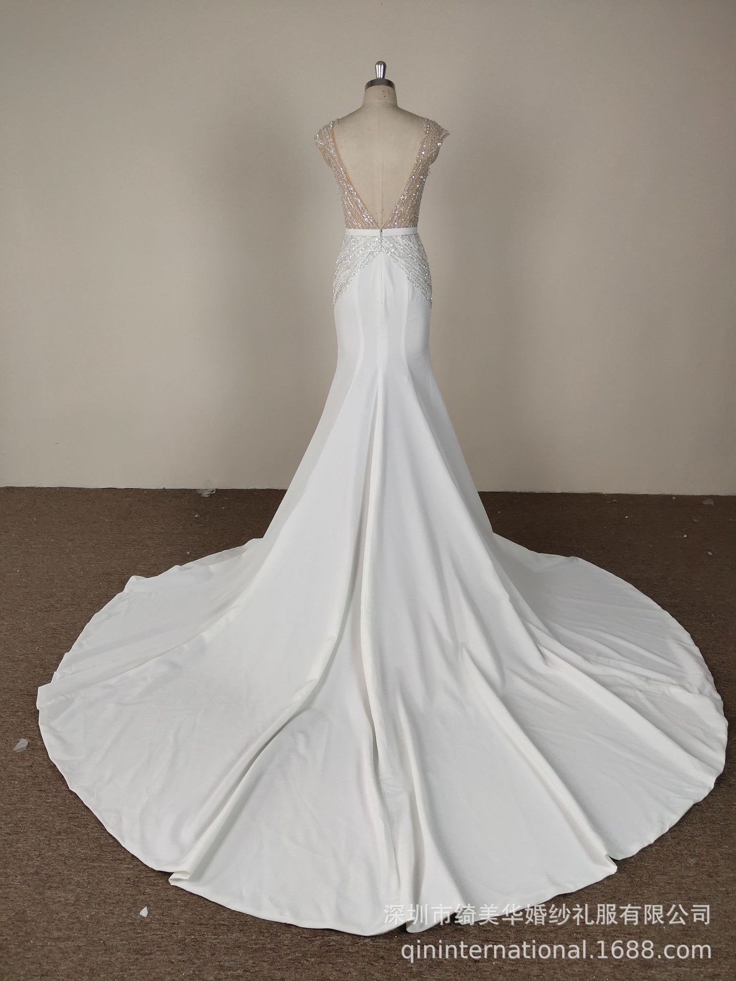 Long elegant beige wedding dress sleevless
