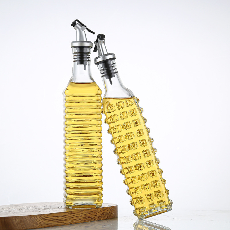 Amazon tallado vidrio de aceite de vidrio 500ml botella de aceite de vidrio de presión no fugas de aceite especial para la botella de aceite de vidrio al por mayor