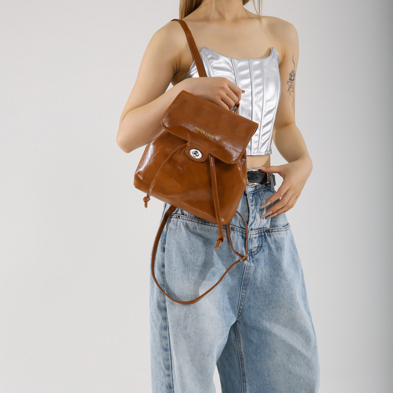 Moda coreana portátil bolso de cubo para mujeres 2024 nueva bolsa de viaje de bloqueo de aire extranjero mochila de ocio