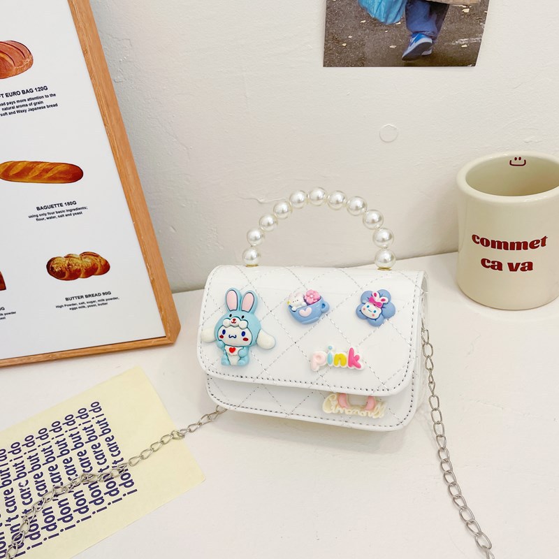 Bolso infantil 2024 nuevo estilo coreano de cadena de dibujos animados bolso de hombro estilo Xiaoxiang Ling mochila para hombres y mujeres bolsos pequeños