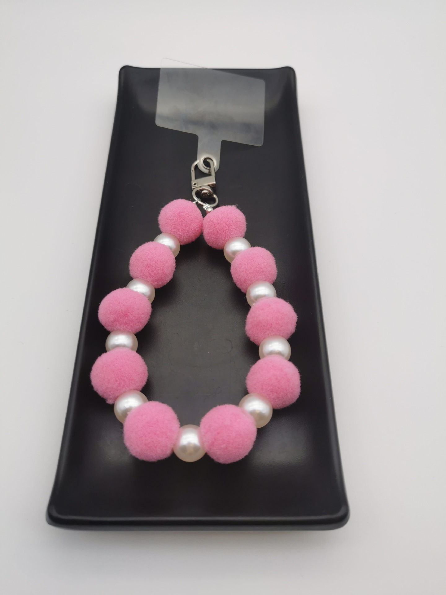 Nueva bola de piel de cadena de perlas colgante cadena de teléfono móvil ins Internet celebridad mismo estilo muñeca de invierno pulsera peluda cadena portátil