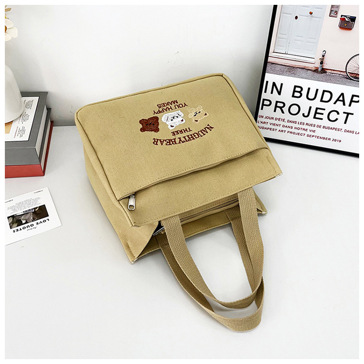 New wholesale fashionable and high-quality canvas handbag, simple and portable, easy to carry for going out, versatile lunch box and bento bag undefined