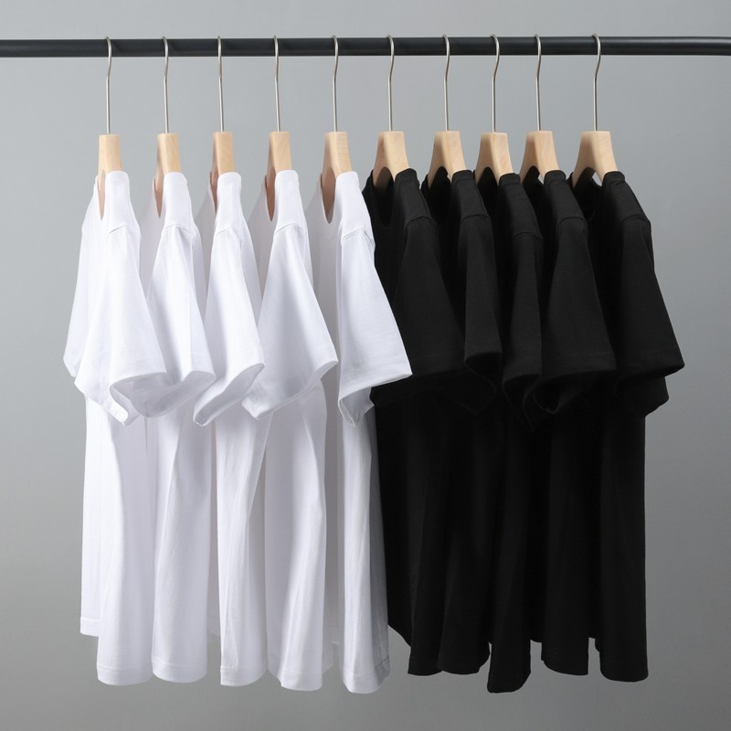 重いポンドの純綿の半袖のtシャツの女性の夏の新型の新疆の綿の純色のゆったりしている丸首の男女の同項のtシャツ|undefined