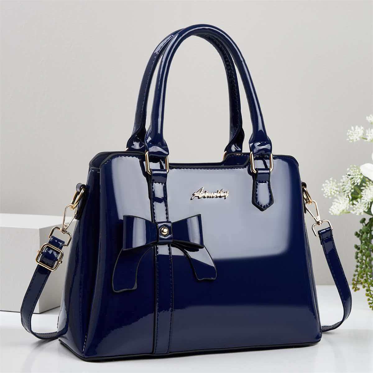 Bolso de mano de arco de piel brillante, bolso de hombro casual de moda, bolso de madre, temperamento, bolso de mochila transfronterizo