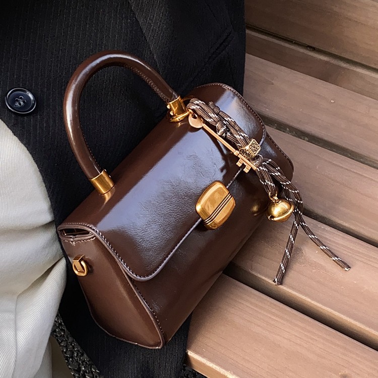 Coreana alta sensación retro bolso mujer 2026 nuevo lujo ligero versátil bolso de mochila de moda bolso de mano