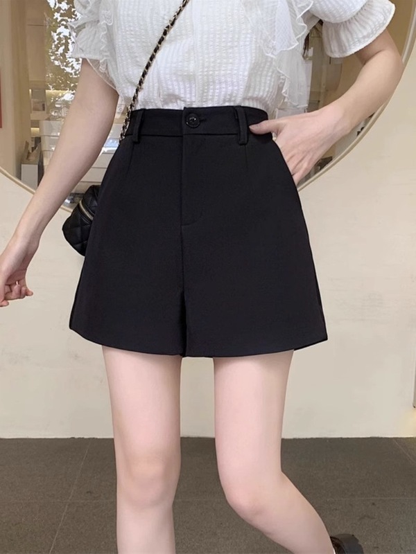 黒いスーツの半ズボンの女性の春の夏の大きいサイズのハイウエストのa字のカジュアルなズボンの外は広い足のズボンを着ています。|undefined
