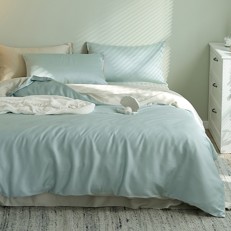 2025 verano fresco juego de cuatro piezas de Tiansi de lujo ligero de alta calidad ropa de cama de seda de hielo cubierta de edredón sedosa ropa de cama desnuda