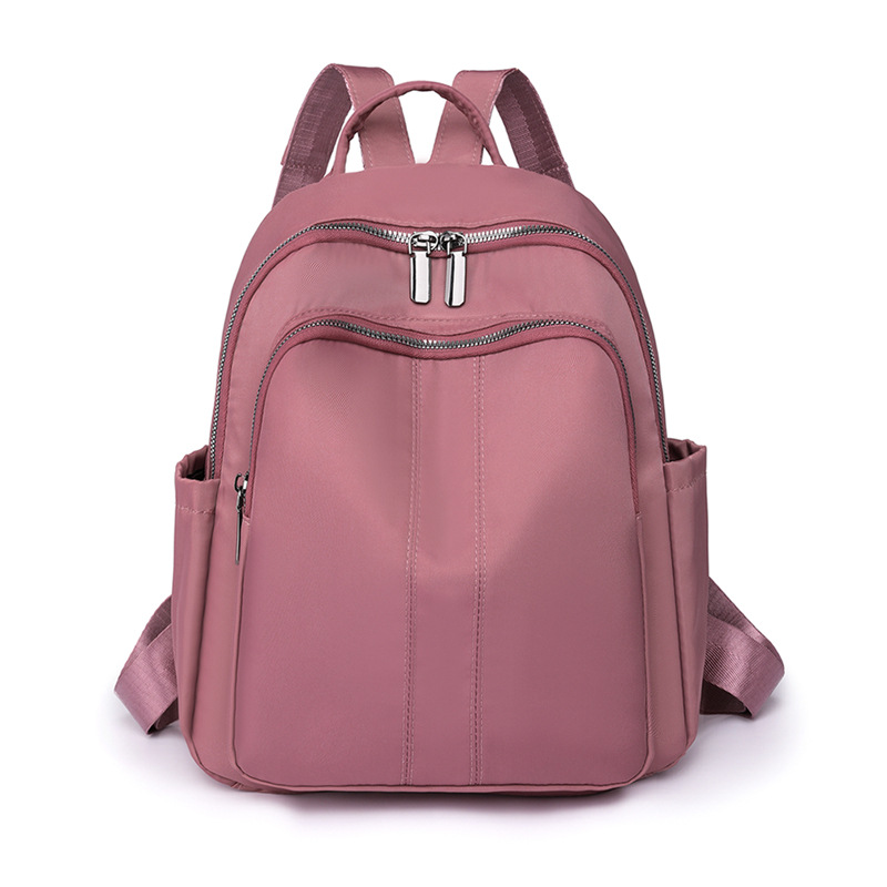 Spot al por mayor 2023 otoño nuevo estilo casual damas mochila de nailon al aire libre mochila de viaje ligera mochila escolar