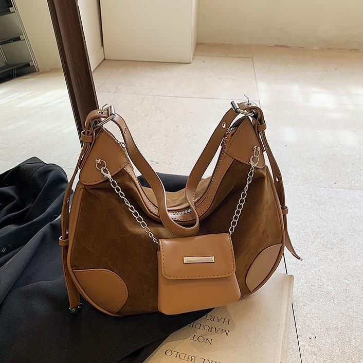 Otoño y invierno bolsas de cuero de gamuz mate para mujeres 2025 nuevas bolsas de brazo de hombro casuales versátiles bolsas de alta calidad de moda
