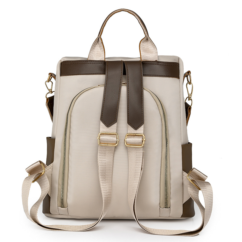 Mochila de mujer de nuevo estilo, color de contraste, casual, moda, mochila de viaje de cercanías, costura simple, mochila de viaje de gran capacidad al por mayor