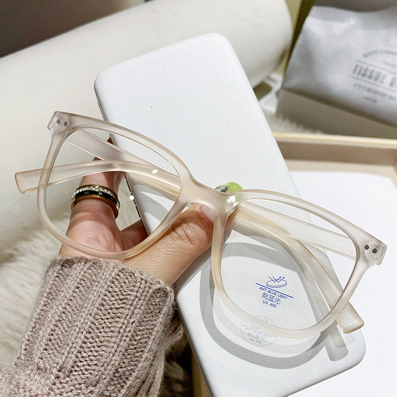 Nuevo Marco de uñas de color beige gafas de luz anti-azul artefacto de belleza liso marco grande que adelgaza versátiles hombres y mujeres gafas de luz anti-azul